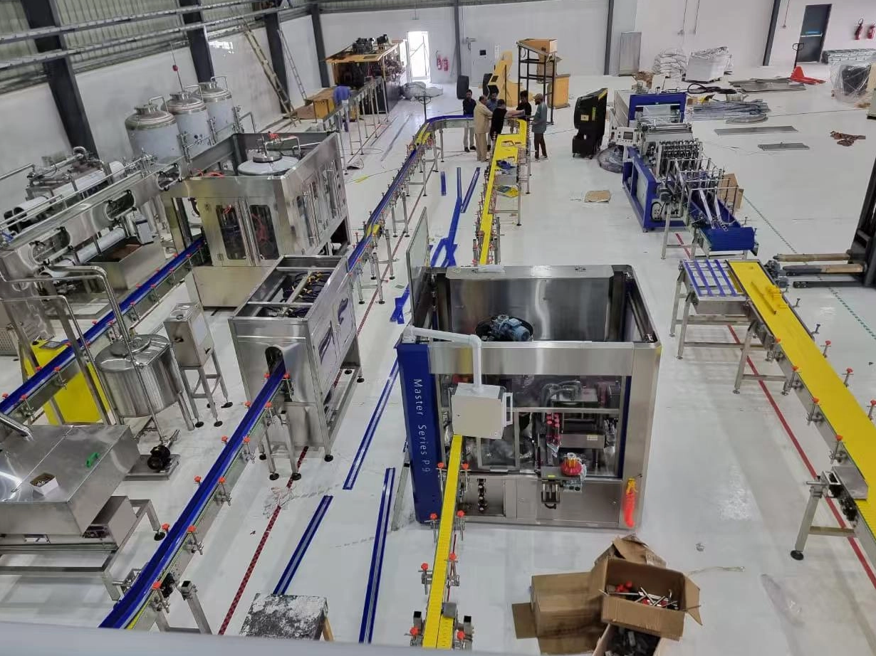 Water filling machine in Philippines factory installed by Nancheng Machinery