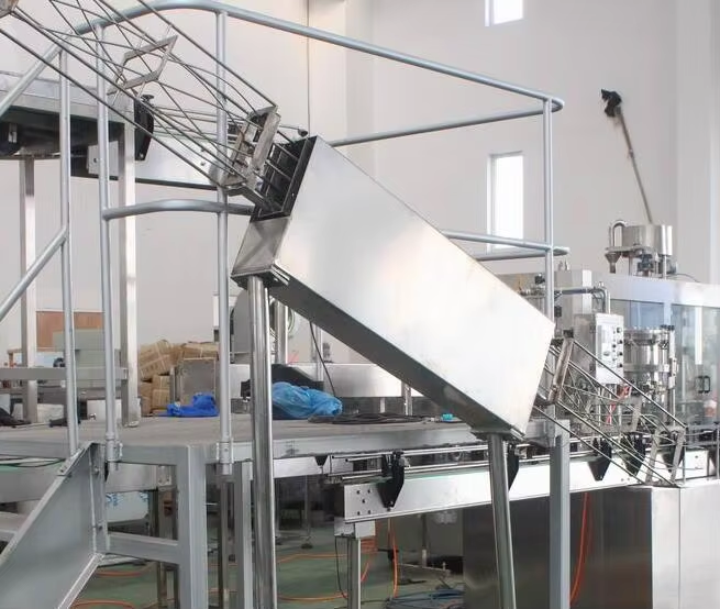 BEER CAN FILLING MACHINE Empty tank spray washer